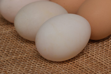 Eggs on wooden background