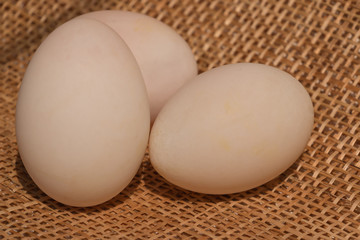 Eggs on wooden background