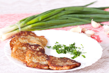 Potato flapjacks with sour cream and leek
