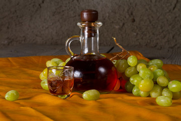Decanter of brandy and grape