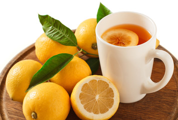 Black tea with lemon closeup isolated