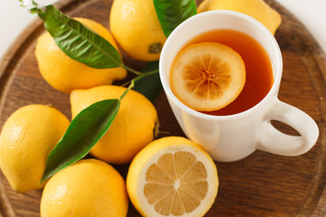Black tea with lemon closeup isolated