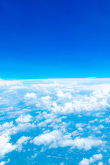 Aerial view of Blue sky and Cloud Top view from airplane window,