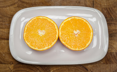 orange fruit slice on white plate