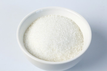 Fototapeta na wymiar white sugar in the white cup