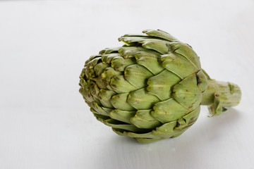 Obraz premium artichoke on white table