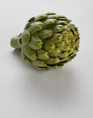 Obraz premium artichoke on white table