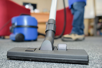 Closeup of vacuum cleaner carpet attachment