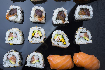 Sushi set isolated on black background