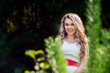 Summer photo smiling girl in a white dress