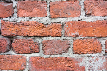 Texture of an old wall from a red brick