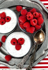 Yogurt with chia seeds and fresh raspberries for healthy breakfa