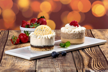 Chestnut cake and lemon cake with strawberries and mint