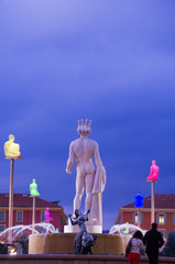 Night time image of La Fontaine du Soleil