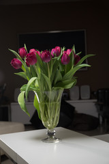 Bouquet of pink tulips in an interior