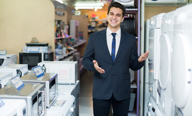 Consultant at household appliances section.