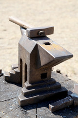 smithy, anvil and hammers