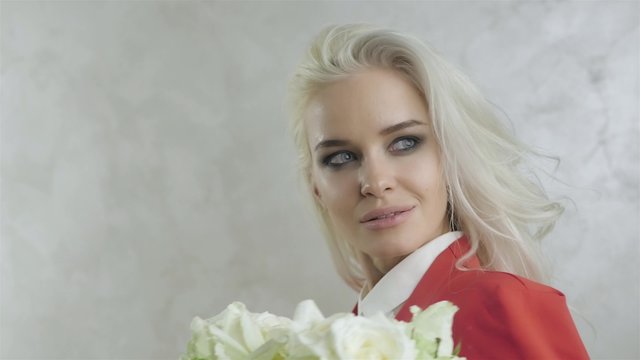 ortrait of Beautiful Young Woman With Flowers