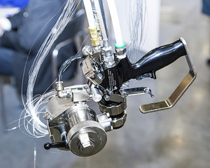 Machine for the production of glass fibers