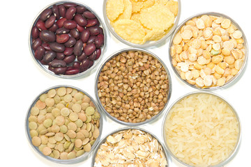 Cereals on a white background: buckwheat, oatmeal, cereal, rice,