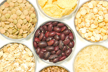 Cereals on a white background: buckwheat, oatmeal, cereal, rice,