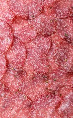 Salami (selective focus) as background image