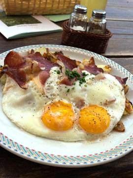 Tiroler Gröstl - Traditional tyrolean plate with fried eggs,potatoes and spek
