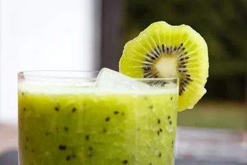 Fotobehang Milkshake kiwi smoothie with fresh fruits