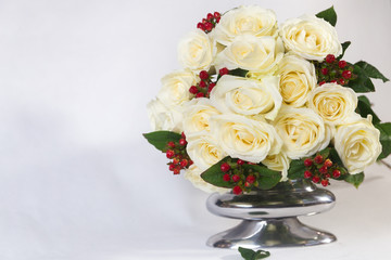 Bouquet of white roses on white background