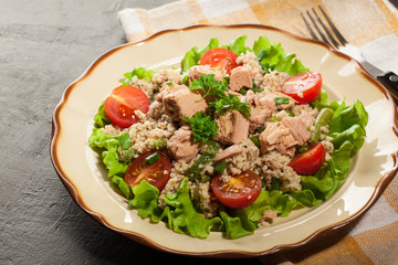 Tasty salad with couscous, tuna and vegetables