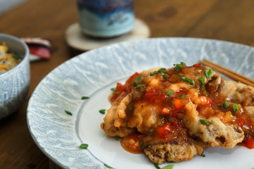 Chinese cuisine, sour and sweet pork with pineapple and pepper