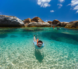 Woman snorkeling in tropical water