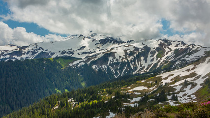 Fototapeta na wymiar Mountain peaks covered with snow, view from Skyline Divide Trail, North Cascades National Park, Mount Baker area