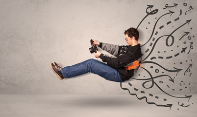 Funny man driving a flying vehicle with hand drawn lines after h