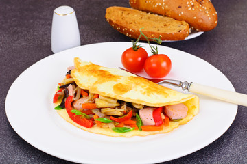 Healthy and Diet Food: Scrambled Eggs with Sausage and Vegetable