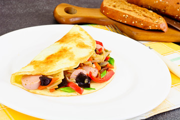 Healthy and Diet Food: Scrambled Eggs with Sausage and Vegetable