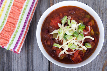 Chili topped with cheese and green onion