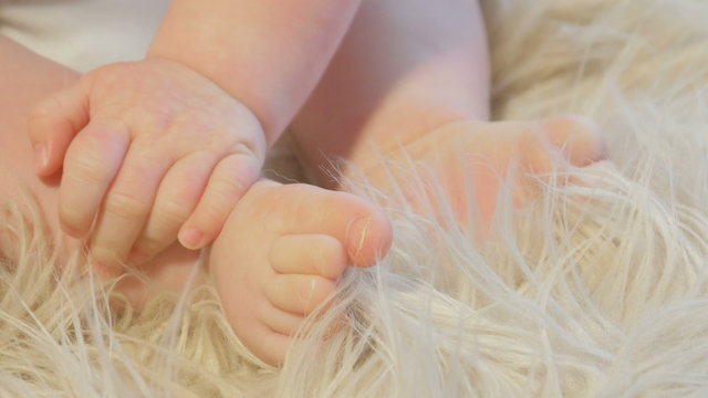 Little baby feet and hands 4K