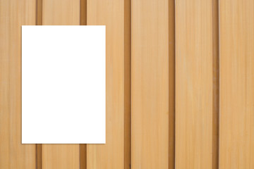 Blank folded paper poster hanging on wooden wall,Template mock up for adding your design.
