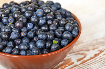 Blueberry on wooden background