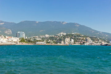 General view on the central promenade and sea port of Yalta, Crimea