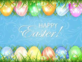 Blue Easter background with eggs in grass