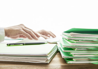 Office desk table with files.