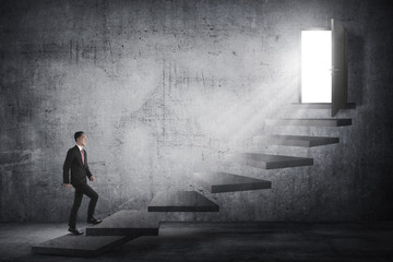 Asian business person going up to the door using stair