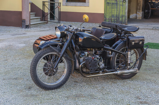 Black motorcycle with sidecar