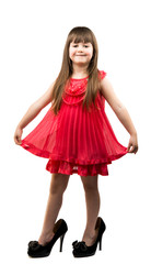 little girl in her mother's shoes