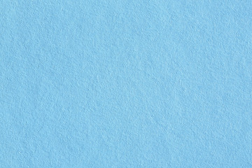Light blue paper texture blank background for template.