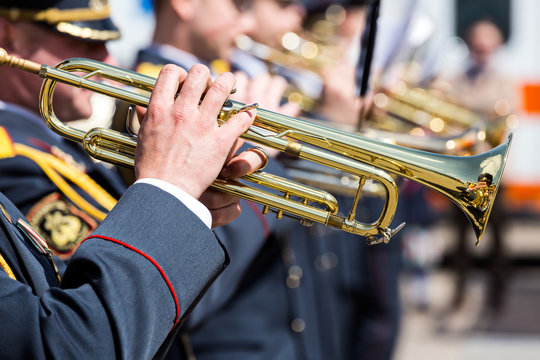 musicians of military orchestra with trumpets at parade