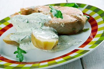 Poached salmon with vegetables