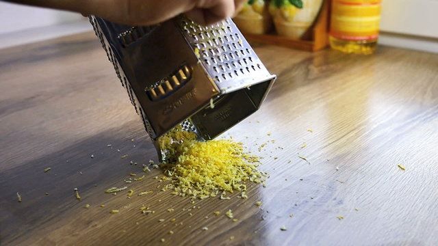 Lemon zest being grated, slow motion